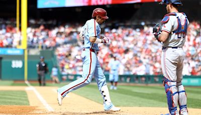 Wheeler tosses 7 strong innings, Realmuto homers as Phillies beat Rangers 5-2 for 3-game sweep