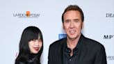 Nicolas Cage, 60, poses with wife Riko Shibata, 28, on Oscars red carpet