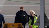 Prince Harry appears to comfort Aberdeen Airport worker as he leaves Balmoral