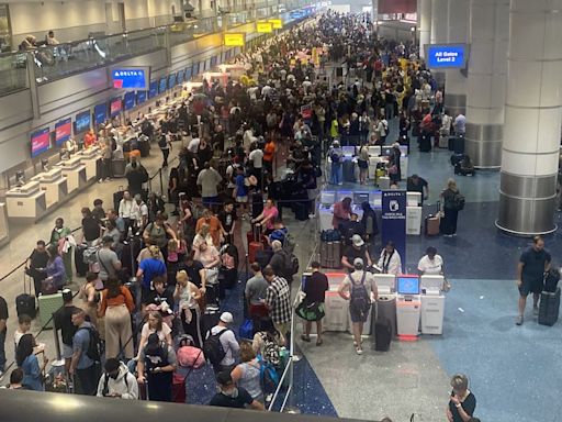 Harry Reid Airport in Las Vegas filled with stranded passengers overnight as systems outage hits airlines
