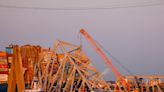 Crews carefully start removing first piece of twisted steel from collapsed Baltimore bridge