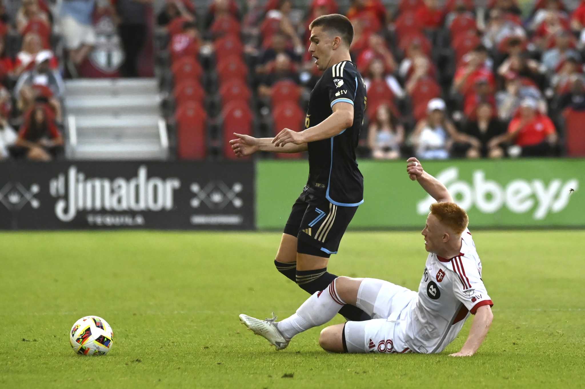 Deandre Kerr scores after own goal by Union's Jack Elliott to rally Toronto to 2-1 victory