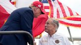 Trump picks up the endorsement of Texas Gov. Greg Abbott during a visit to a US-Mexico border town