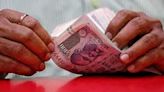 Rupee ends lower pressured by weaker yuan; Fed Powell's remarks in focus