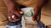 Nigeria's naira recorded a historical plunge after being floated freely