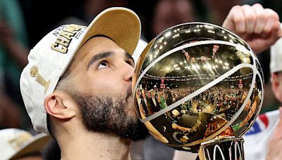 Jayson Tatum got a tattoo of himself with the Larry O'Brien Trophy