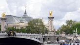 Poor water quality in Seine causes cancellation of swimming triathlon training but organisers remain hopeful for event