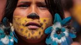 Indigenous groups gathering in Brazil’s capital to protest president’s land grant decisions