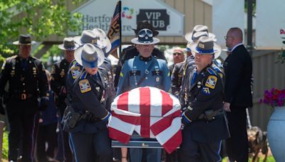 Thousands of police join family to mourn CT Trooper Aaron Pelletier at funeral