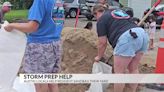 Austin residents help local woman prepare her home for more flooding