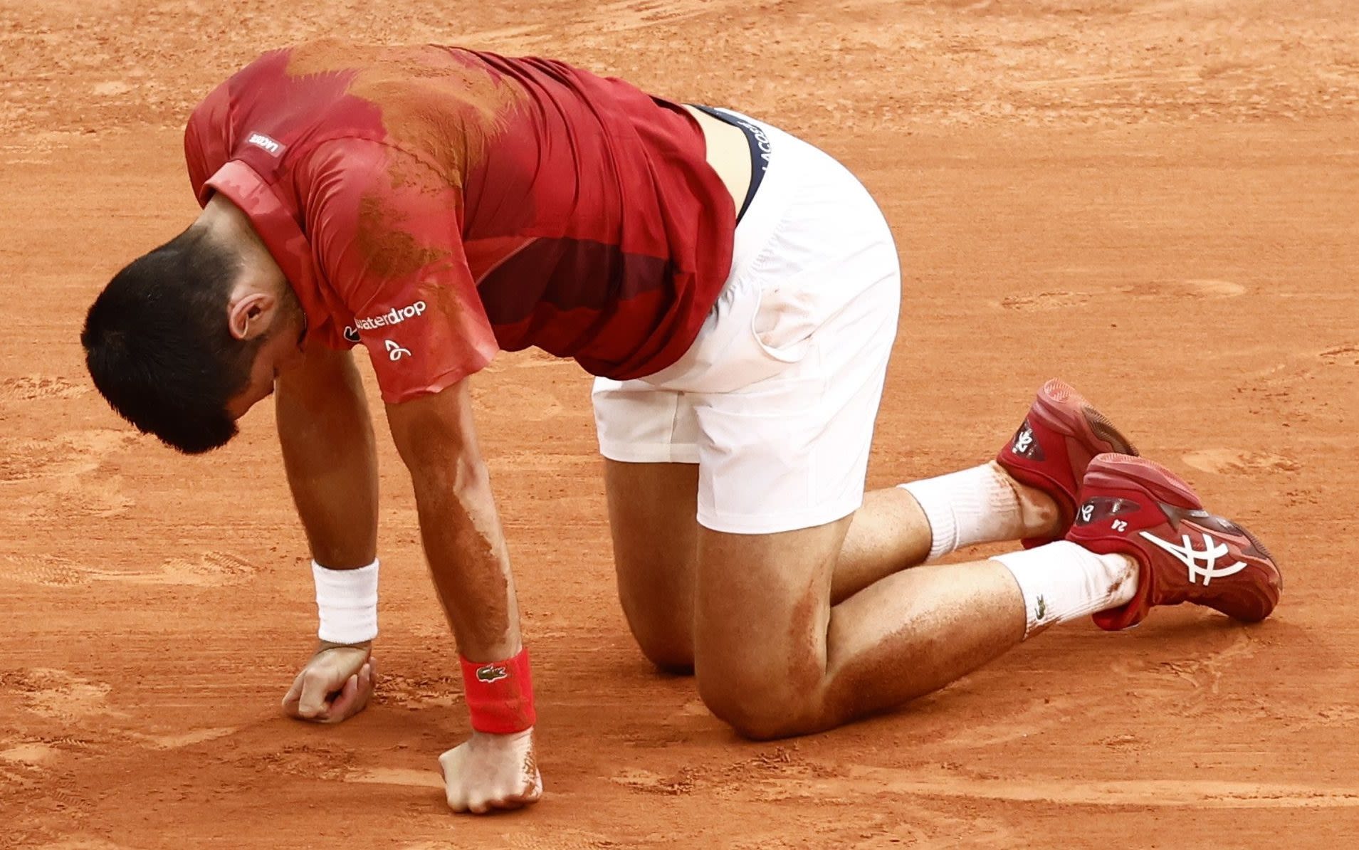 Novak Djokovic overcomes injury scare in five-set thriller at French Open