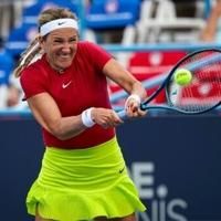 Victoria Azarenka returns a shot during her victory over American Hailey Baptiste at the WTA Washington Open