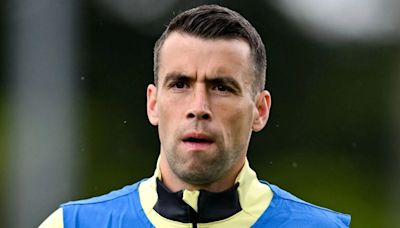 Seamus Coleman reacts to Heimir Hallgrimsson as he makes tournament challenge