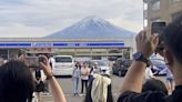 To fend off tourists, a town in Japan is building a big screen blocking the view of Mount Fuji