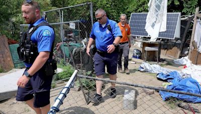 St. Louis clears riverfront homeless camp over flood risk. ‘No warning,’ residents say.