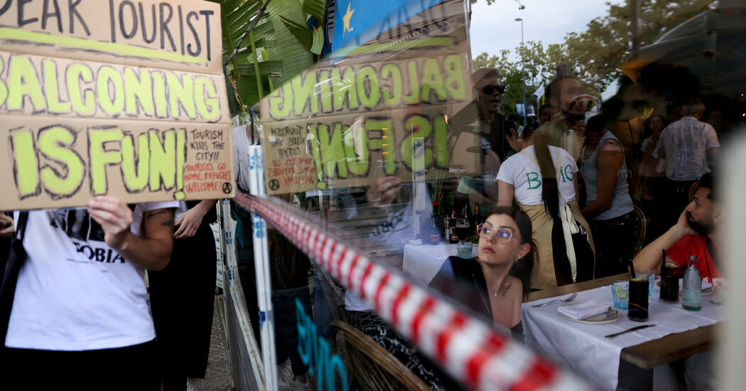 Squirt Guns and ‘Go Home’ Signs: Barcelona Residents Take Aim at Tourists