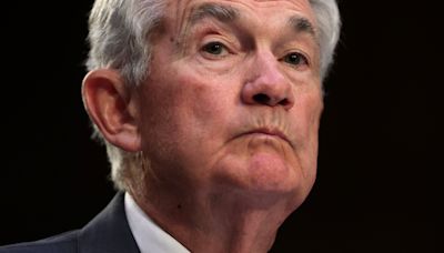 Bitcoin Little-Changed Above $57K as Fed Chair Powell Testifies to Congress