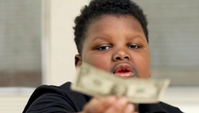 A boy gave away his only dollar. In exchange, he was rewarded for his generosity.