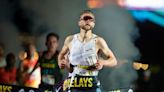 Oregon's Elliott Cook gives it a go against world champ Josh Kerr during Oregon Relays