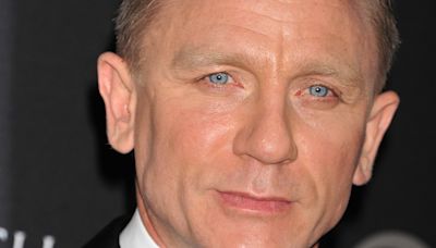 Daniel Craig looks suave as he rocks new look for Olympic visit