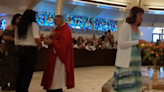 Priest bites woman after denying her Communion