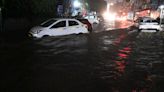 SUV spins out of control in Gurgaon's flooded waters after heavy rain, driver stuck inside. Video