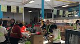 Nearly 200 volunteers gather at Daily Bread Food Bank to sort, pack food ahead of Thanksgiving