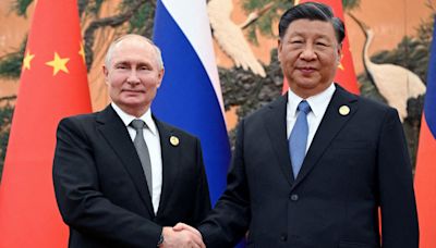 Vladimir Putin seeks to cement China relations on state visit to Beijing