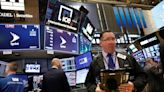 Weary Wall Street cheers improved consumer confidence