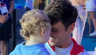 Tom Daley celebrates his Olympic win with sons in Paris