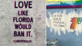 Street Artist Trolls Ron DeSantis With Guerrilla 'Say Gay' Campaign In Orlando