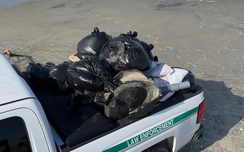 US Navy confirms trash that washed ashore on Outer Banks was from one of its ships