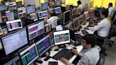 Sensex, Nifty retreat from record highs to close flat ahead of key US Fed rate decision