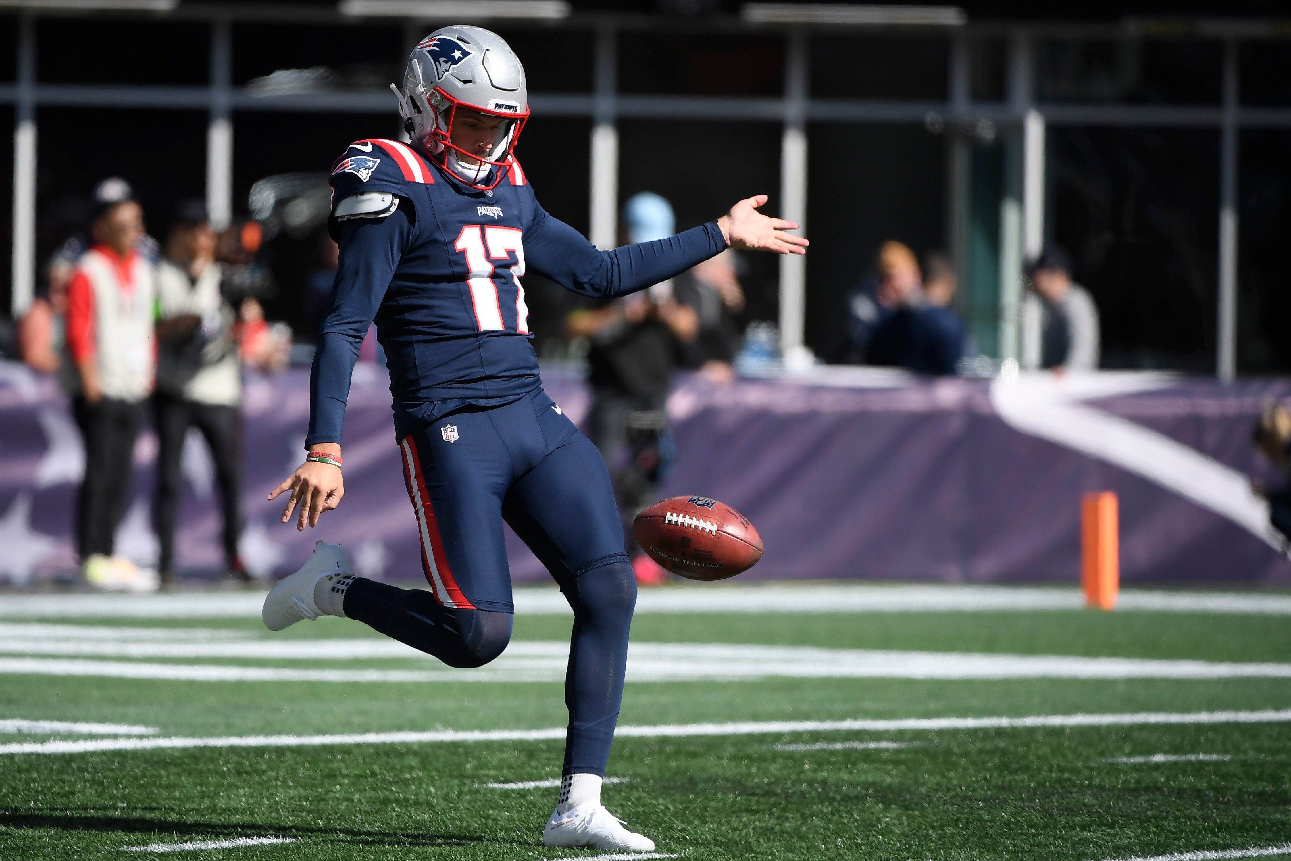 Patriots punter Bryce Baringer playing with Wayland's Liam Gill at State Am golf tourney