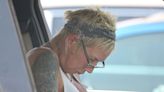 Reclusive Kim Mathers seen sleeping at the wheel of her car during shopping trip