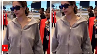 Malaika Arora makes a style statement at the airport amid break-up rumours with Arjun Kapoor; See pics | Hindi Movie News - Times of India