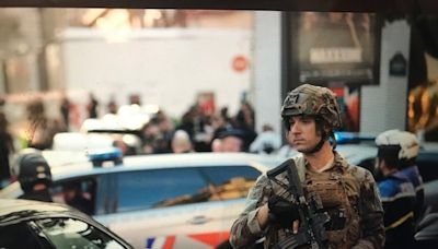 French police officer stabbed in Paris as attacker 'neutralised' outside luxury store