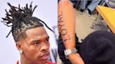 Lil Baby says the tattoos seen on his arms in a recent viral video were fake after backlash from his fans