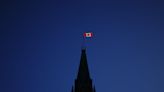 Different schools of thought on why Canada drapes itself with red and white