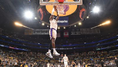 LeBron scores 30, and the Lakers avoid 1st-round elimination with a 119-108 win over champion Denver