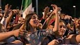 Supporters of Mexico's new president Claudia Sheinbaum wait for her at a hotel prior to her election win on June 2, 2024