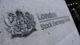 London's FTSE 100 dragged by oil majors, but logs weekly gain