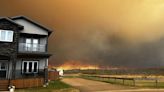 ‘Day by day’: Alberta fire evacuees out until next week, weather to help B.C. crews