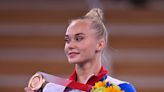 A Russian gymnastics gold-medalist posed with the pro-war 'Z' symbol at Putin's Victory Day Parade