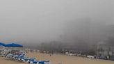 Video shows Benidorm beach disappearing in 'bizarre' fog leaving Brit tourists fuming