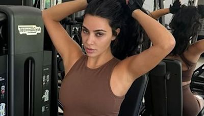 Kim Kardashian uses muscle stimulator pads for 'leg day' at the gym