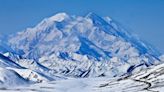 Skis seen in snow lead rescuers to man’s body buried in avalanche, Alaska rangers say