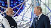 Peace talks don't succeed amidst bombs: Modi to Putin