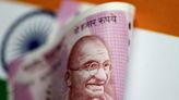 Indian rupee closes flat as RBI seen arresting currency slide