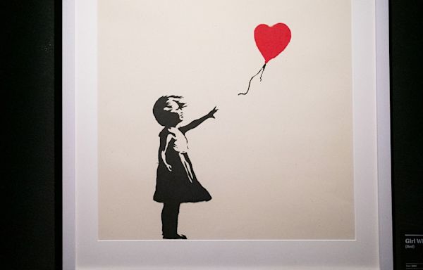 Two charged with stealing Banksy artwork 'Girl with a Balloon' from London gallery